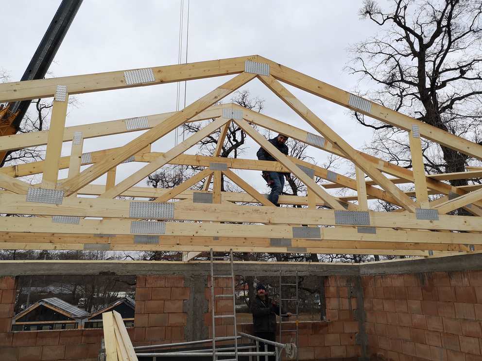 Grinzi lamelare curbe